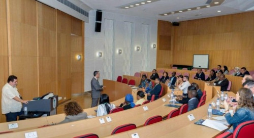 Participants attend talk