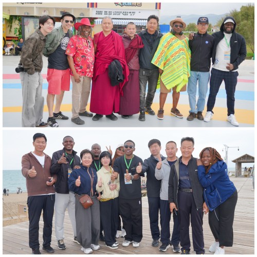 Photograph of interaction between artists, local residents, and tourists